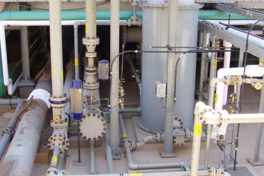 Process Piping Outside Industrial Building | Industrial Plant Construction Contractors | Wollam Construction