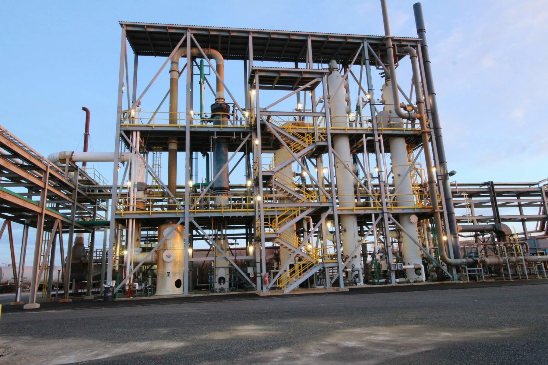 structural steel contractors erect framing for above-ground pipes | Industrial Plant Construction Contractors | Wollam Construction